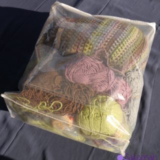 Quick Tip for Organizing Your Crochet and Yarn Stash - Save your plastic zippered bag from comforters and pillows for yarn and project storage - more on Sakeenah.com